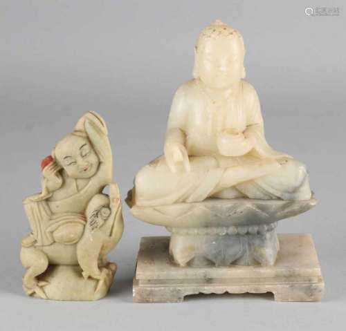 Two antique Chinese Oriental natural stone buddhas. Large figure has minimal chip. Size: 12 -18