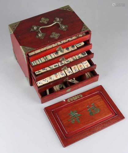 Ancient Chinese Mahjong game with legs playing pieces. In wooden box. 20th century. Size: 17 x 24