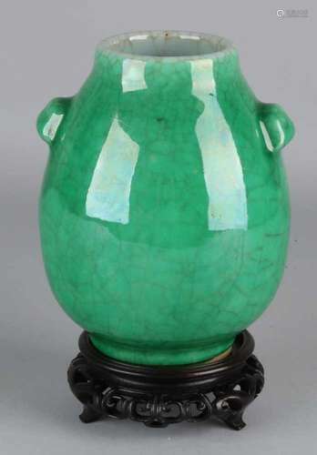 Antique Chinese porcelain green glazed vase with crackle glaze. Size: 17 x 12.5 cm ø. In good