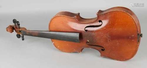 Old / antique violin with label 'Antonius Stradivarius - Made in Germany'. Part missing, otherwise