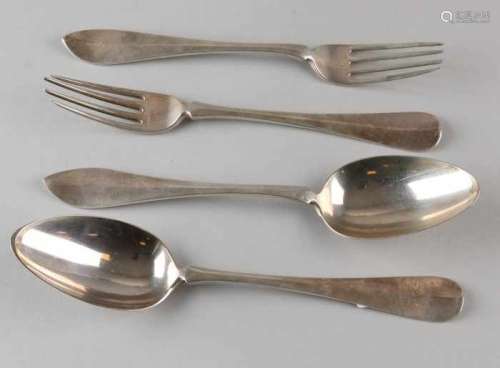 Two sets with a silver spoon and fork, 833/000. One place setting with a pointed stem with engraving