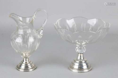 Cut crystal cream jug with ear handle and matching coupe. Both with almond shavings and silver 835/