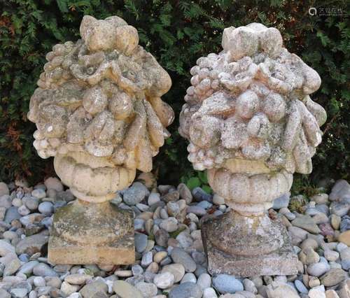 Two large concrete garden ornaments with fruit. 20th century. Size: 65 x 35 cm ø. In good condition.