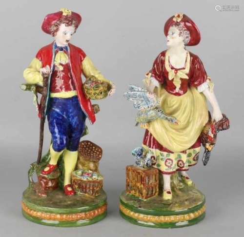 Two large German Sitzendorf porcelain figures. Farmers couple. 20th century. Hand painted by AH