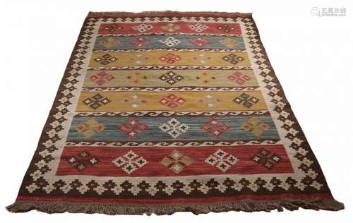 Old Persian kilim rug in earth tones. Abstract floral. Size: 170 x 230 cm. In good condition.