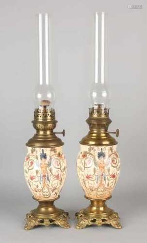 Two antique kerosene lamps with ceramic spacers. Renaissance style. Historism. Circa 1880. Size: