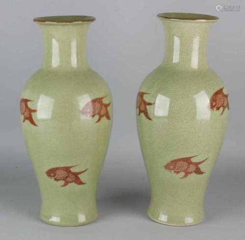 Two large old Chinese porcelain vases with crackle glaze and carp decors. With soil mark. Size: H