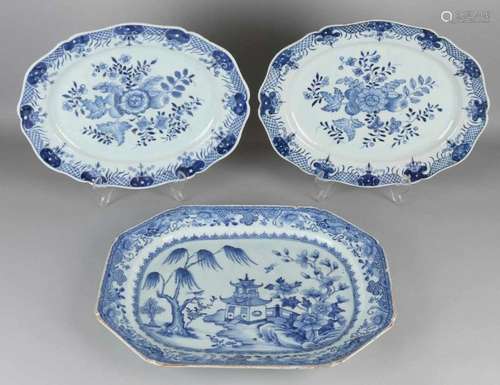 Three large 18th century Chinese porcelain meat dishes with landscape (chips) and twice floral