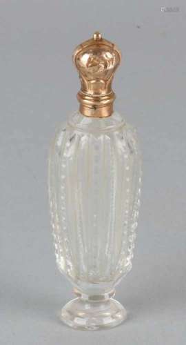 Crystal petal bottle on foot with yellow gold cap, 585/000, Oval bottle with grinding with golden