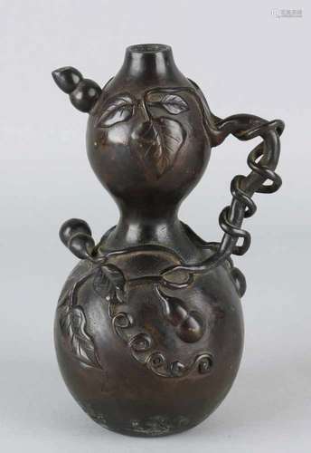 Antique Chinese or Japanese bronze gourd-shaped jug with bottom mark. 19th century. Size: 19 cm.