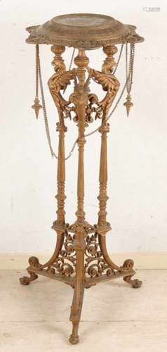 Beautiful 19th century cast iron table for vase or flower pot. With phenixes. Size: 89 x 35 cm ø. In