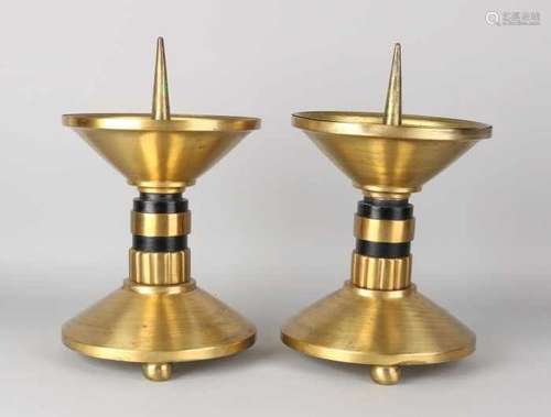 Two large Art Deco brass ecclesiastical candlesticks. Circa 1930. Size: 34 x 21 cm ø. In good