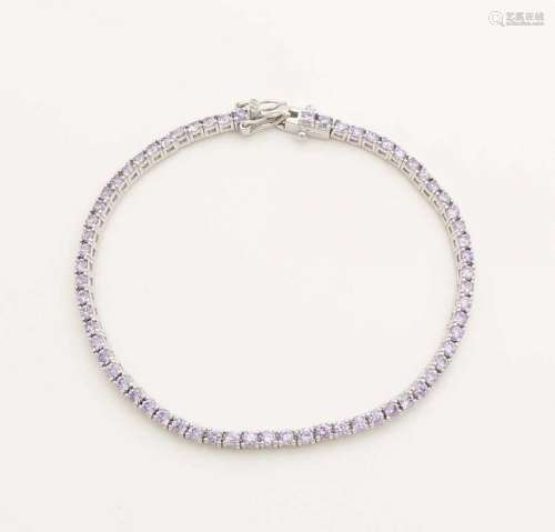 Silver tennis bracelet, 925/000, with lilac zirconia's. So called tennis bracelet fully set with