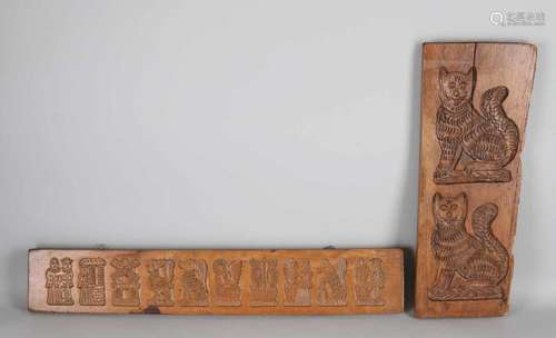 Two antique gingerbread planks. 19th Century and later. Worm condition. Size: 49 - 67 cm. In