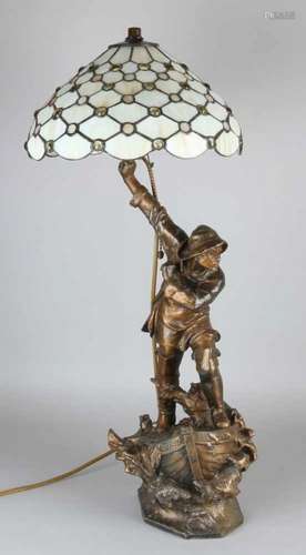 Antique table lamp with stained-glass shade. Composition metal, bronze colored. Later electrified.