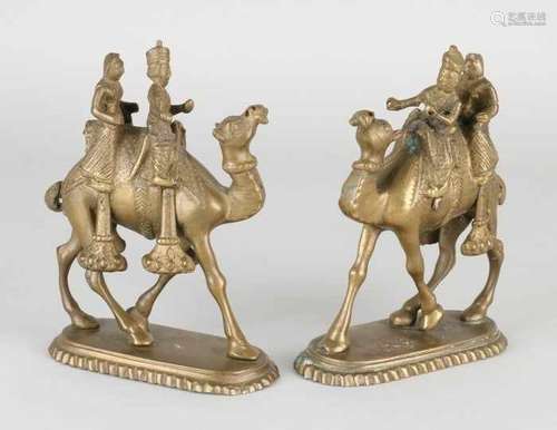 Two Oriental bronze camels with figures. First half of 20th century. Size: 12 x 15 x 5 cm. In good