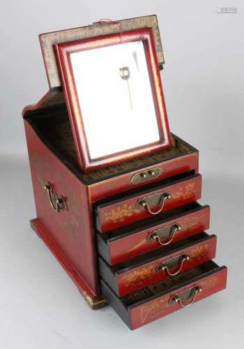 Old Tibetan leather-covered jewelry box. With gold decor, four drawers and lid. 20th century.