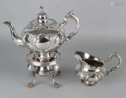 Silver tea can on comforter and creamer. 833/000, Tea can and cream can be richly decorated with
