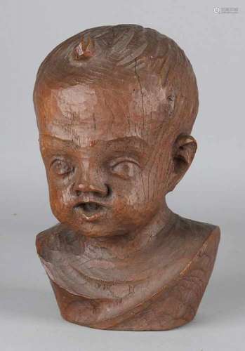 Oak carved baby bust. Circa 1900. Size: 22 cm. In good condition. Eiche geschnitzte Babybüste. Um