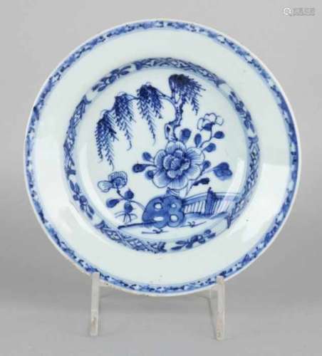 18th Century Chinese porcelain deep Qung Lung plate with garden decor. Size: ø 16.5 cm. In good