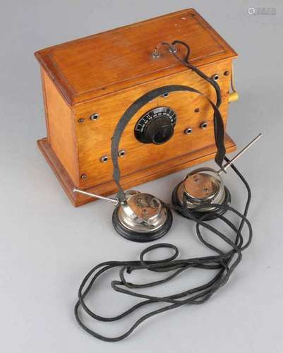 Antique German transmitter equipment with headphones with antenna. Signature Neufeld & Kuhnke