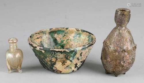 Three times authentic Roman glass objects. Consisting of: Bottle with nubs, good. Squeeze bottle,