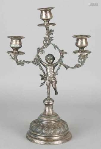 German 19th century historicism candlestick with putti. Three-light. Circa 1880. Size: H 32 cm. In