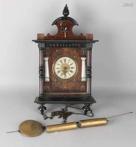 19th Century German Schwarzwald wall clock with porcelain columns. So-called Bismarck Uhr. Circa