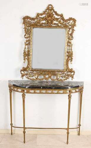 Old Italian brass mirror with console table and black marble top. Second half of the 20th century.