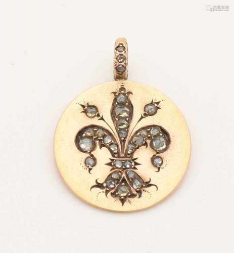 Golden round pendant, 585/000, decorated with a French lily made of diamonds with an old cut. ø 20