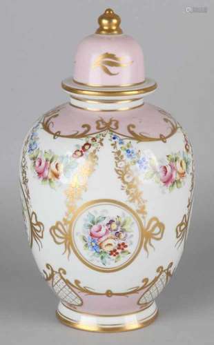 Antique hand-painted porcelain covered vase with floral and gold decor. Circa 1900. Size: H 26 cm.