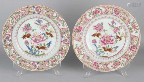 Two 19th century Chinese porcelain Family Rose plates with floral decors. Size: ø 23 cm. In good