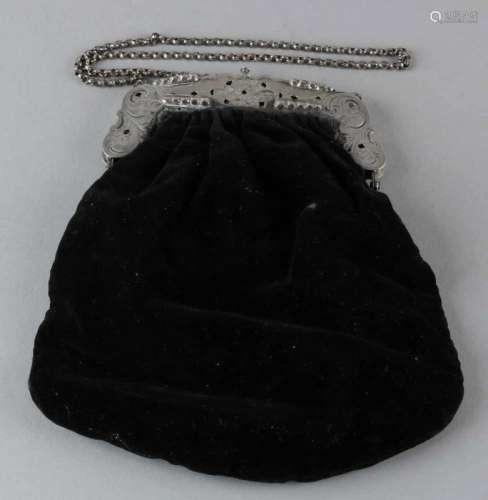 Bag with silver bracket and chain, 833/000. Carved pocket bracket cut open and decorated with