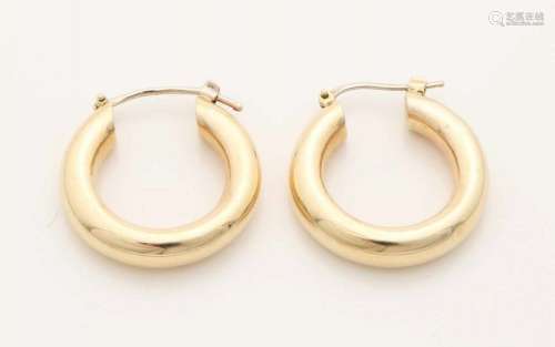 Yellow gold earrings, 585/000, out of round tube, ø 5mm, with hinged plugs at the top. ø 23 mm.