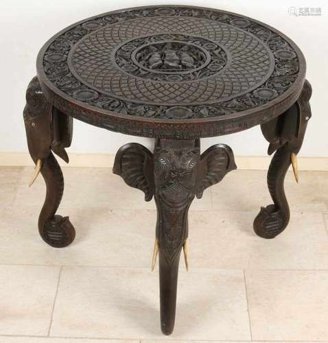 Indonesian wood-stoned elephant table with figures and floral representation in leaf. With ivory