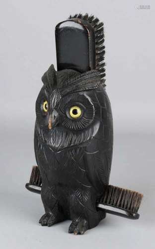 Antique wood-stained three-piece clothing brush set with wood-stained owl with glass eyelets.