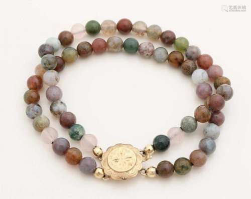 Bracelet with quartz and yellow gold clasp, 585/000. Bracelet with 2 rows quartz beads, ø 6 mm,