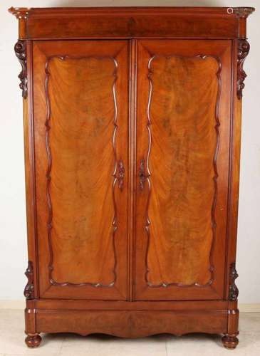 Dutch mahogany Biedermeier maiden closet. Circa 1840. Below with one drawer, interior with various