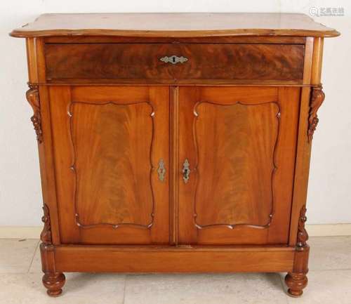 Dutch mahogany Biedermeier penzen cabinet with carving on the beaks, sides with tear, otherwise