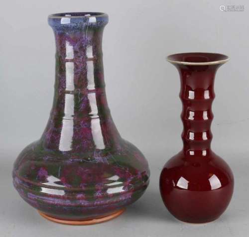 Two old Chinese porcelain vases. One time Sang de Boeuf vase. Once blue-green iridescent glaze