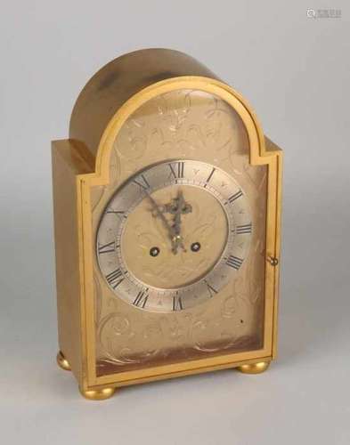 Heavy brass pendulum with upper balance. Eight-day movement, half-hourly on bell. Signed Just. Size: