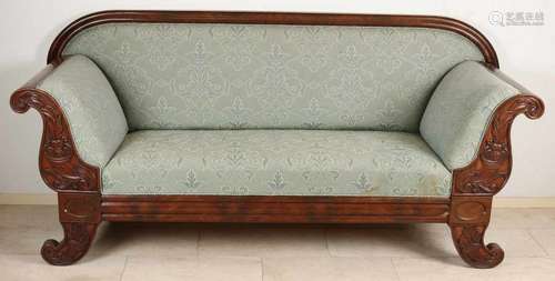 Mahogany German Biedermeier couch with curved armrests with beautiful carving in the front,