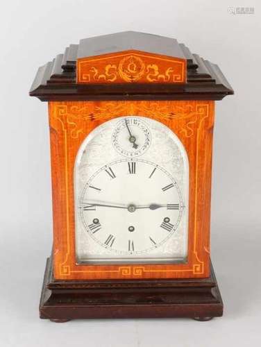 Antique German Kienzle walnut table clock with intarsia. Westminster quarters on five gong bars.