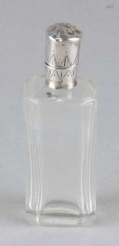 Cut crystal cap bottle with silver frame and cap. Various performances, complete with silver