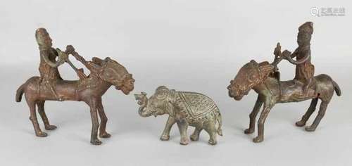 Two African bronze figures on donkeys + Indian elephant. 20th century. Size: 20 x 22 x 6 cm. In good