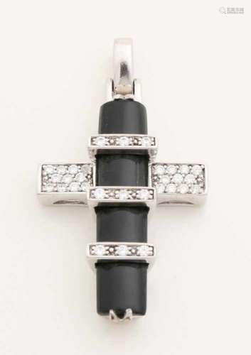 Silver pendant, 925/000, in the shape of a cross with onyx and zirconias. 30x55mm. about 15 grams.