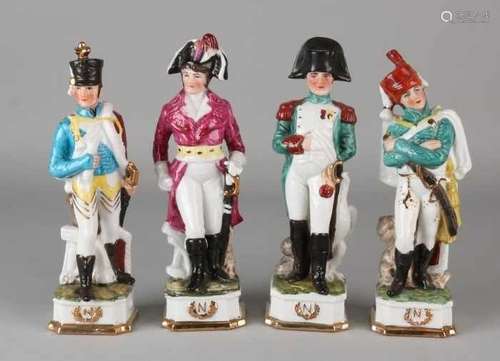 Four old porcelain soldiers. Signature Napoleon. 20th century. Size: 19 - 20 cm. One damaged. In