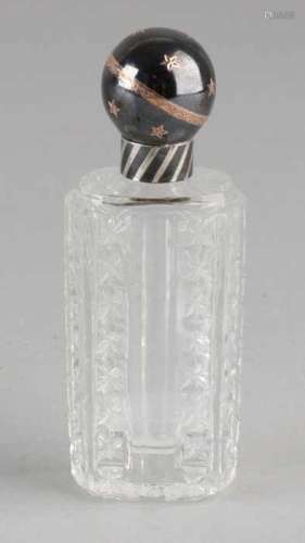 Cut crystal pewter bottle with special silver frame. With round Niello cap as a globe. With inlaid