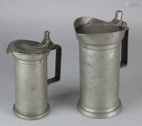 Two 19th century pewter donut jugs. France. Size: 20 - 23 cm. In good condition. Zwei Zinnkrapfen