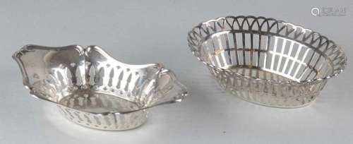 Two silver bonbon dishes, an oval cut-out bonbon basket, 835/000, with bevelled edge, 13x10x4cm, a